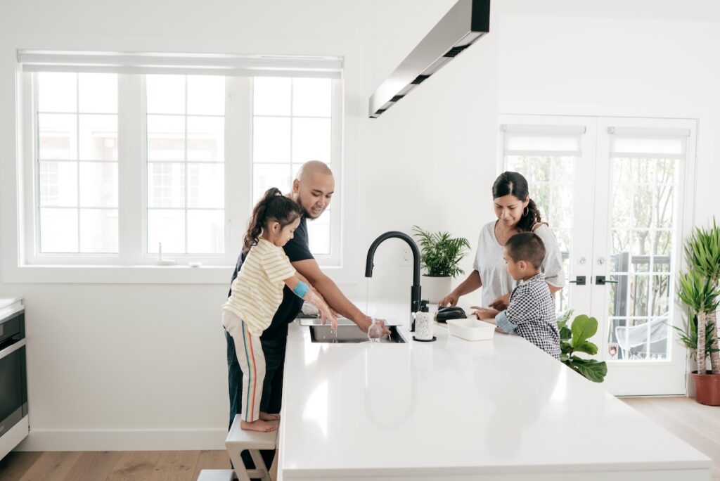 family washing their hands
