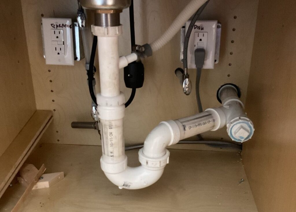 pipes under a sink