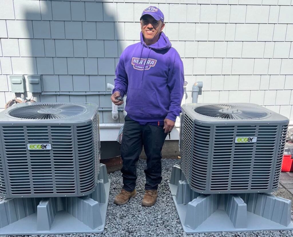 New era worker next to heat units