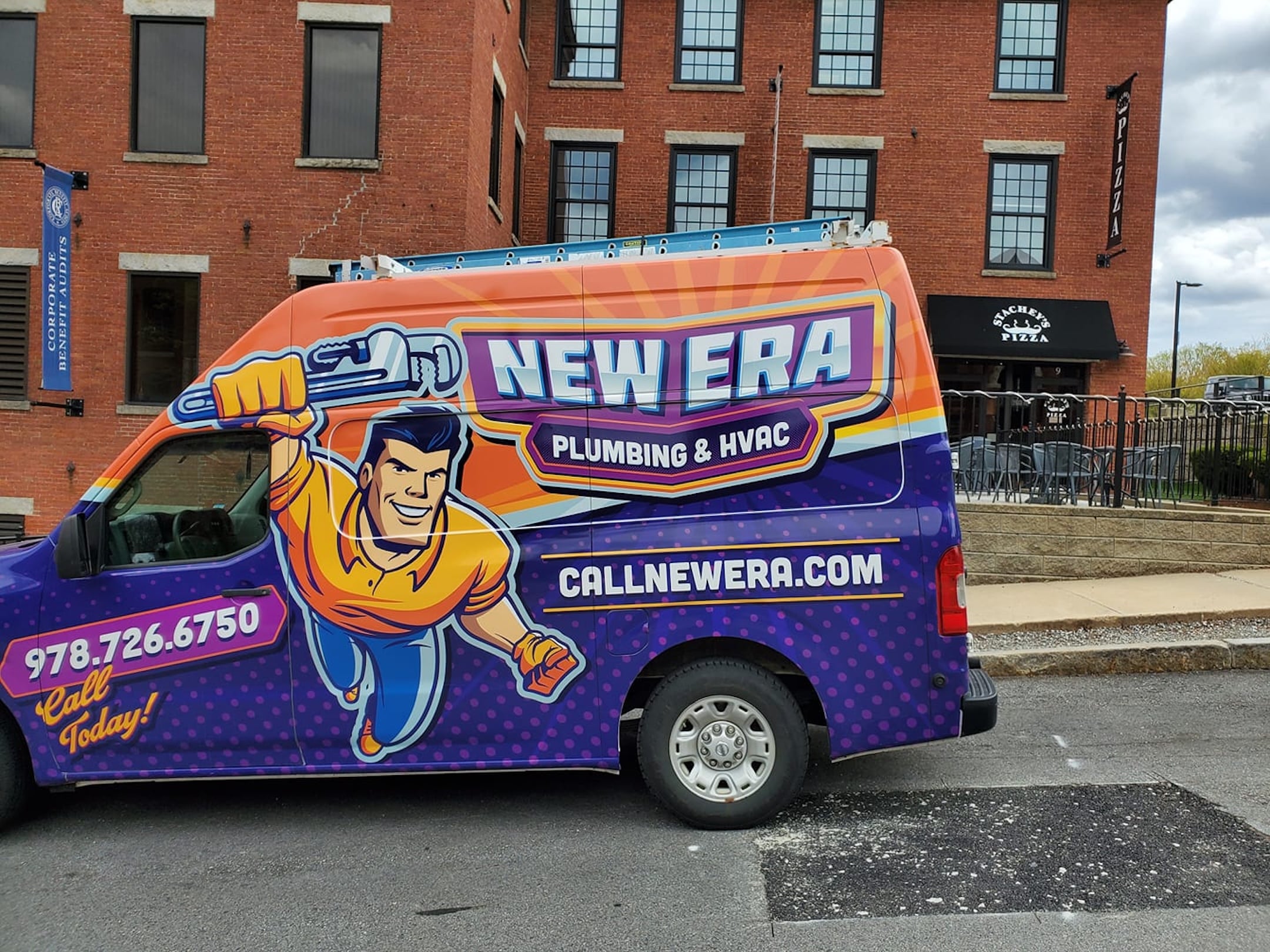 New Era truck outside a building