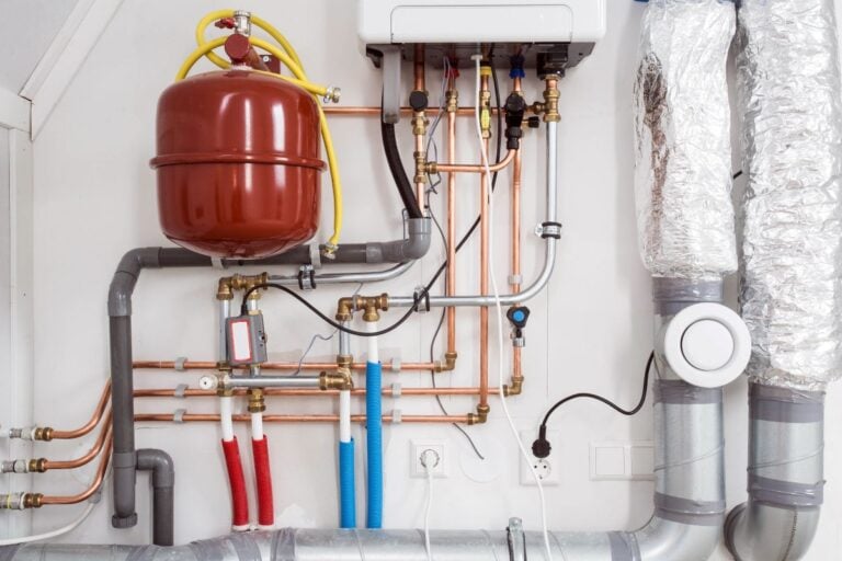 boiler vs furnace room with unit and water tank
