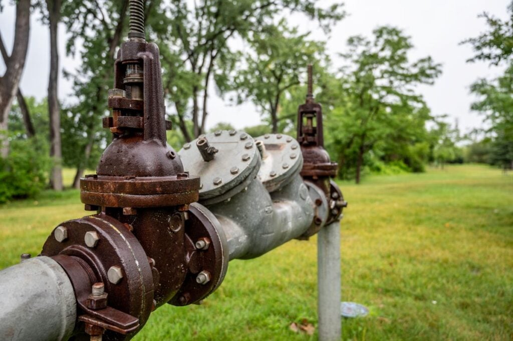 backflow valve green grass