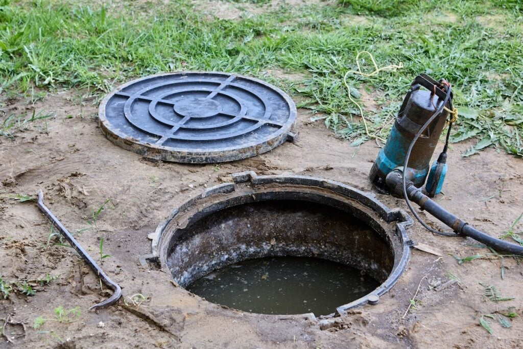Near septic tank there is submersible wastewater pump to pumping sewage containing fecal matter.