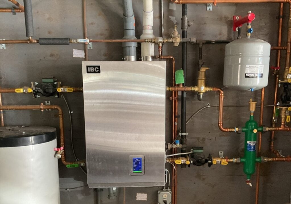 A water heater and copper pipes