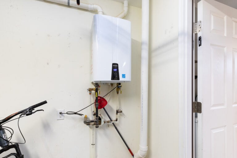 tankless water heater cost tank on light yellow image