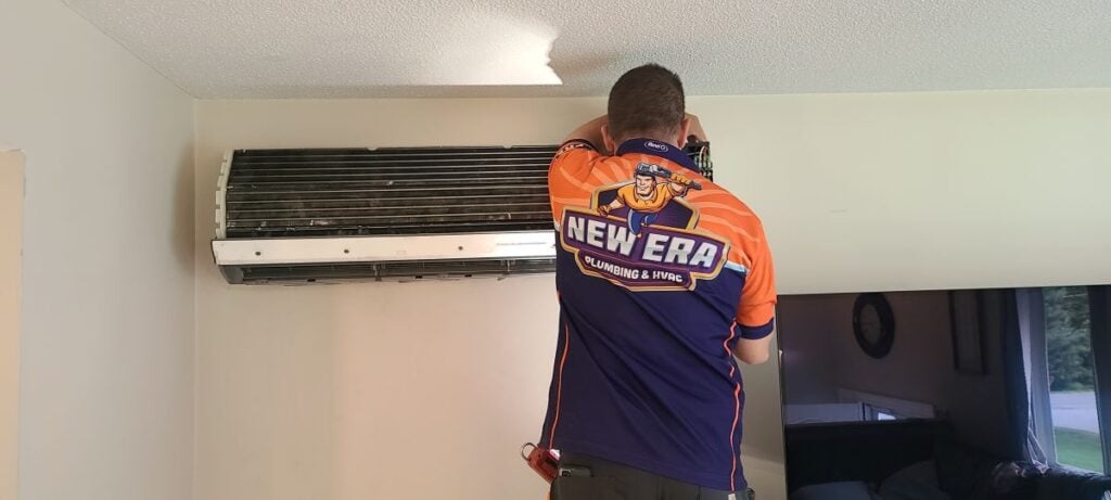 mini split heat pump worker repairing unit